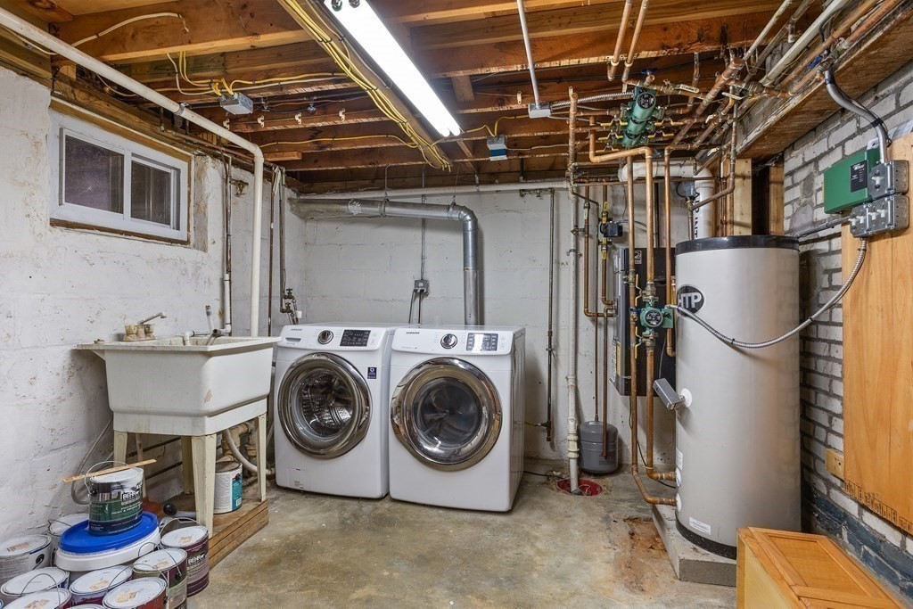 140 Lowell Street Lexington, MA 02420 - Photo 31 of 37 a utility room with dryer and washer