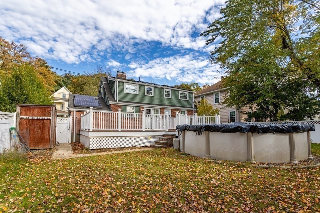140 Lowell Street Lexington, MA 02420 - Photo 32 of 37 front view of a house with a large tree
