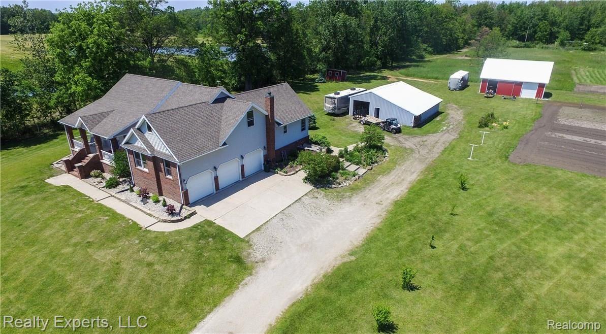 9770 Grames Road Maybee, MI 48159 - Photo 56 of 61 Right side of home
