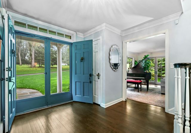 a view of a livingroom with furniture and garden