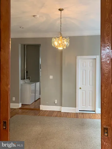 a view of a chandelier in a room
