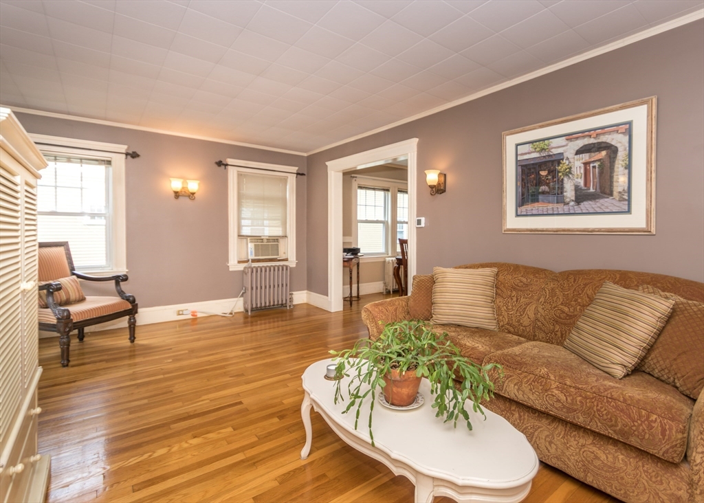 48 Bruce Road Waltham, MA 02453 - Photo 13 of 39 a living room with furniture and a large window