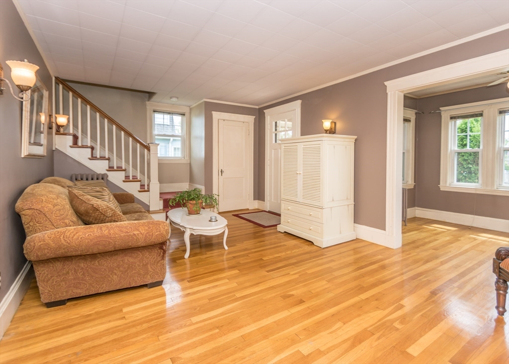 48 Bruce Road Waltham, MA 02453 - Photo 15 of 39 a living room with furniture and a wooden floor