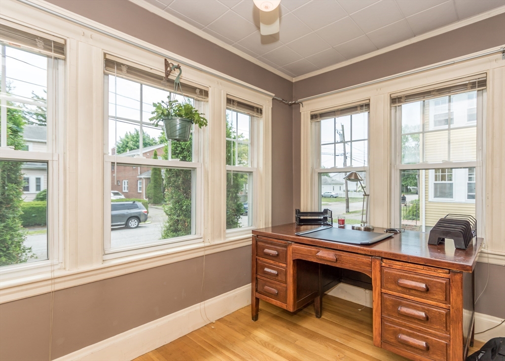 48 Bruce Road Waltham, MA 02453 - Photo 17 of 39 a room with a large window and table