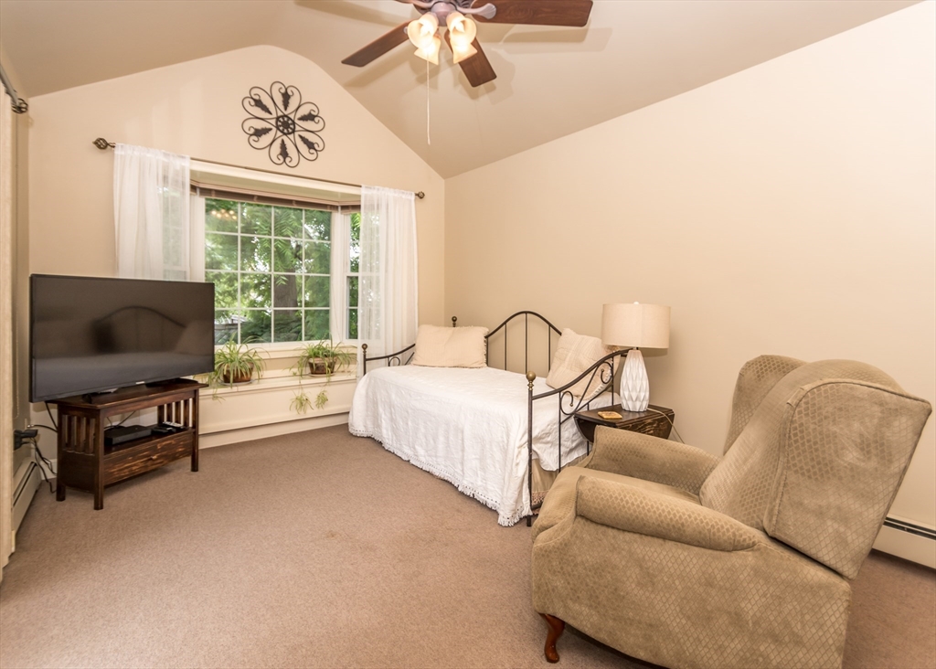 48 Bruce Road Waltham, MA 02453 - Photo 20 of 39 a living room with furniture and a flat screen tv