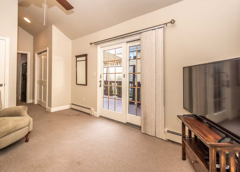 48 Bruce Road Waltham, MA 02453 - Photo 22 of 39 a view of livingroom with furniture and windows