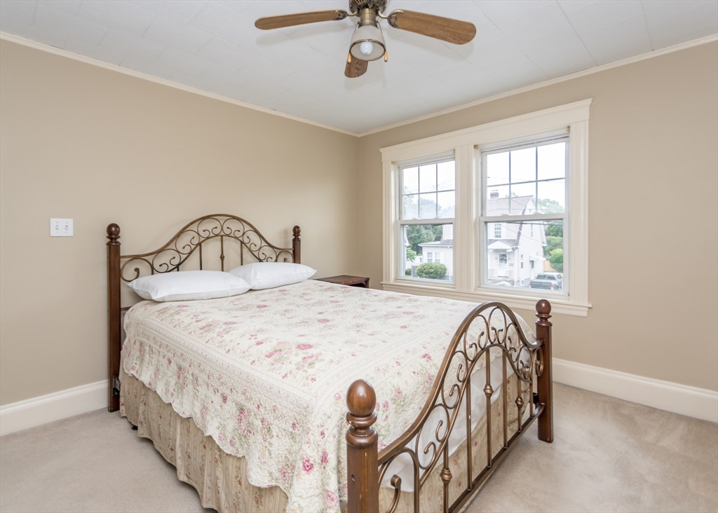 48 Bruce Road Waltham, MA 02453 - Photo 24 of 39 a bedroom with a bed and a window