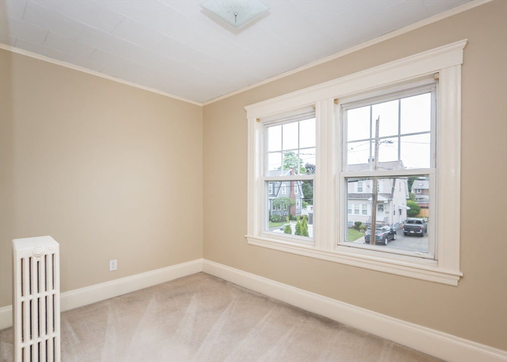 48 Bruce Road Waltham, MA 02453 - Photo 28 of 39 an empty room with a window