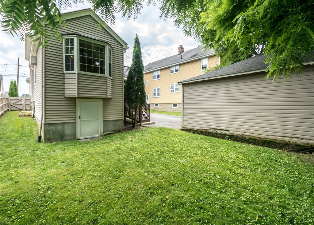 48 Bruce Road Waltham, MA 02453 - Photo 37 of 39 a view of house with backyard