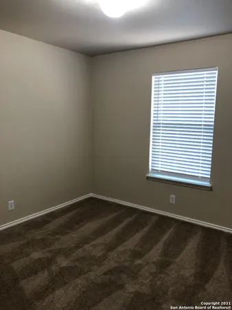 a view of a room with a window