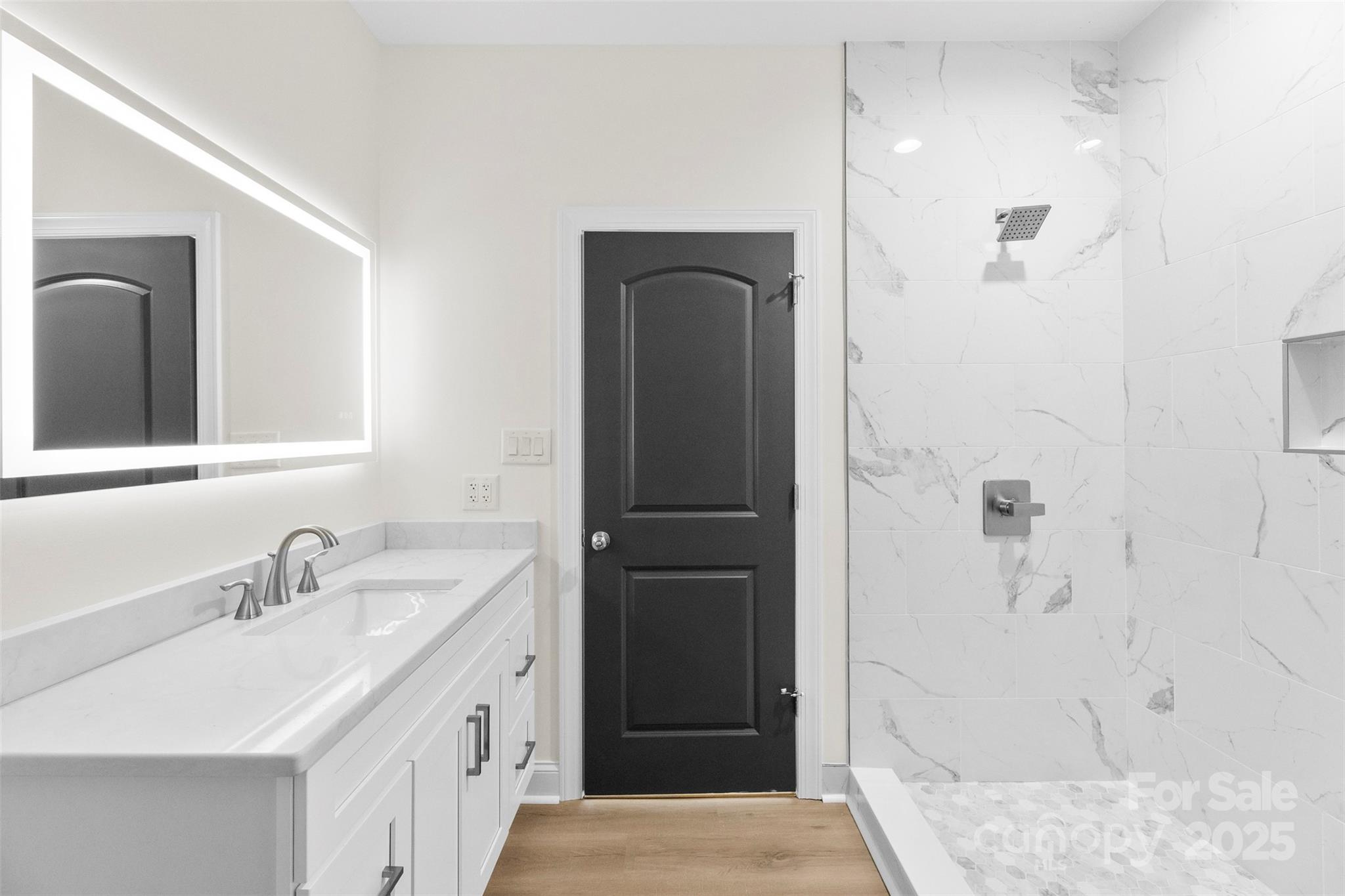 215 Benfield Road Kings Mountain, NC 28086 - Photo 19 of 25 a bathroom with a double vanity sink a mirror and shower