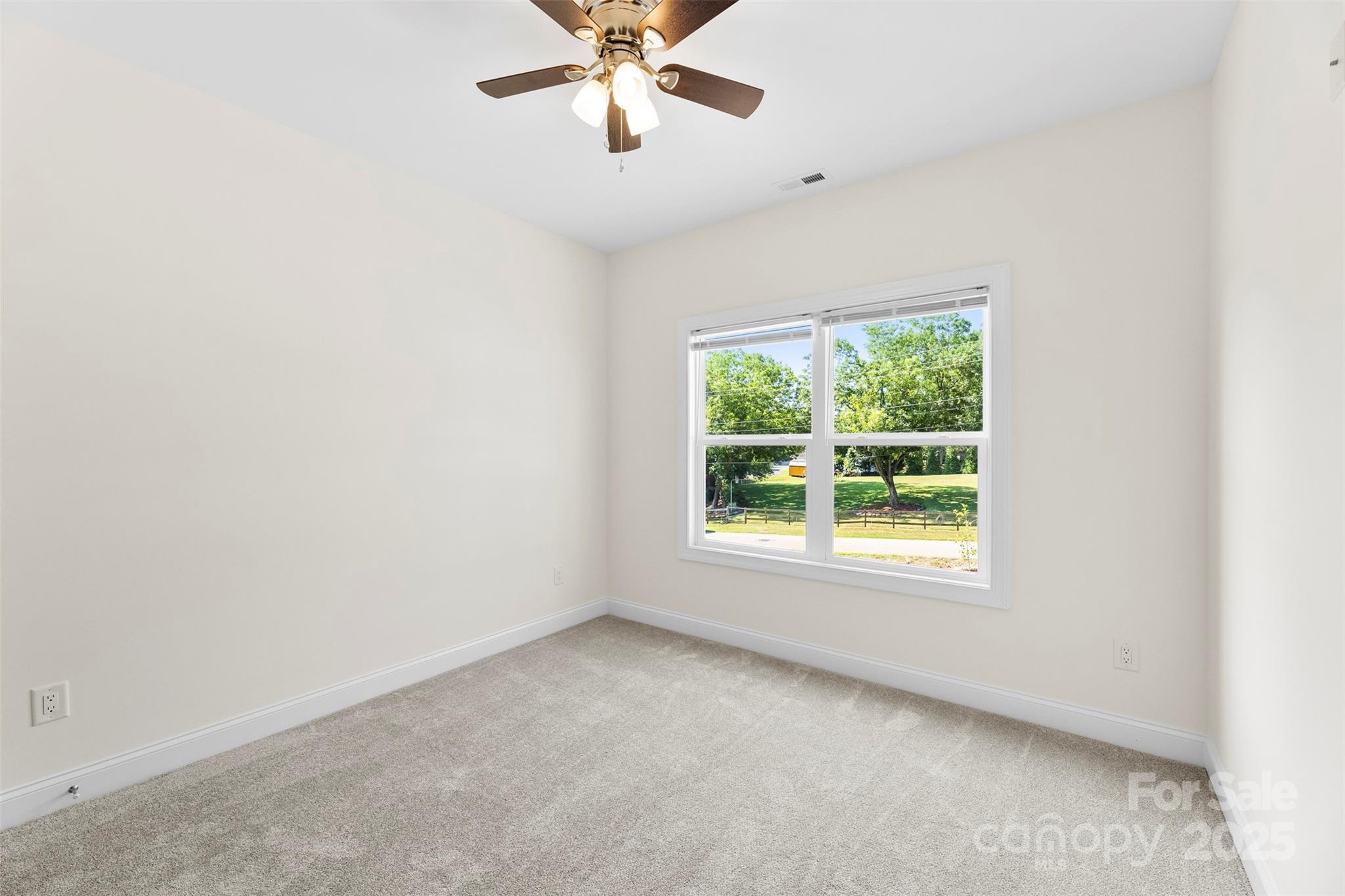 215 Benfield Road Kings Mountain, NC 28086 - Photo 21 of 25 an empty room with a window