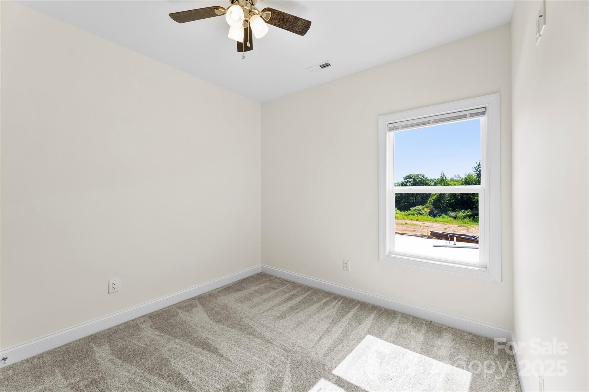 215 Benfield Road Kings Mountain, NC 28086 - Photo 24 of 25 an empty room with a window