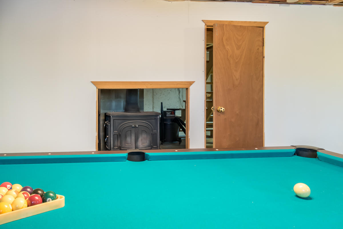 156 Soper Road Durham, ME 04222 - Photo 28 of 35 Rec Room wood stove