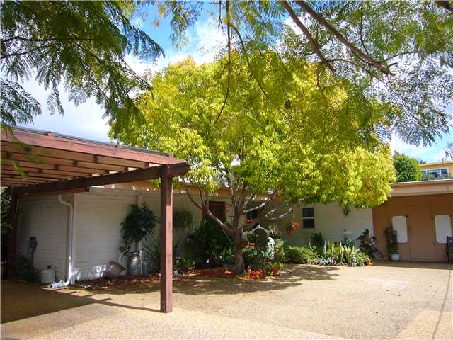 1330 East Fallbrook Street Fallbrook, CA 92028 - Photo 17 of 22 Once you're through the Gate there is plenty of parking area on the "Pebbled" drive and under the carport.