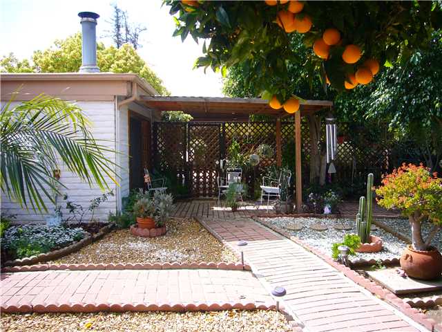 1330 East Fallbrook Street Fallbrook, CA 92028 - Photo 18 of 22 This patio is off the Dining Room. Notice the LOW maintenance landscaping.