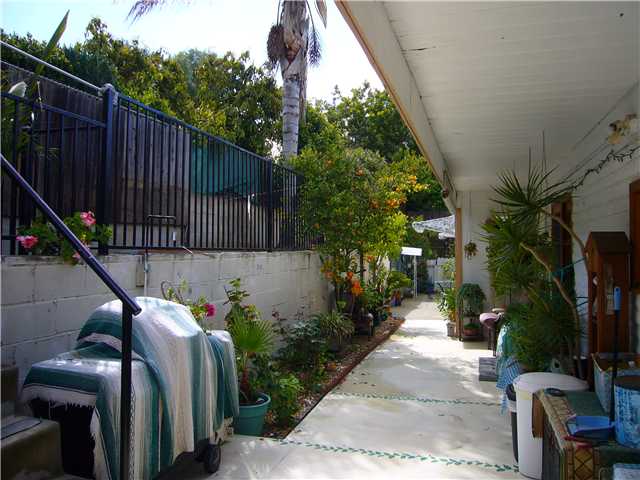 1330 East Fallbrook Street Fallbrook, CA 92028 - Photo 20 of 22 Side patios/walkway with a few steps to access the upper level to the pool and a possible garden area.
