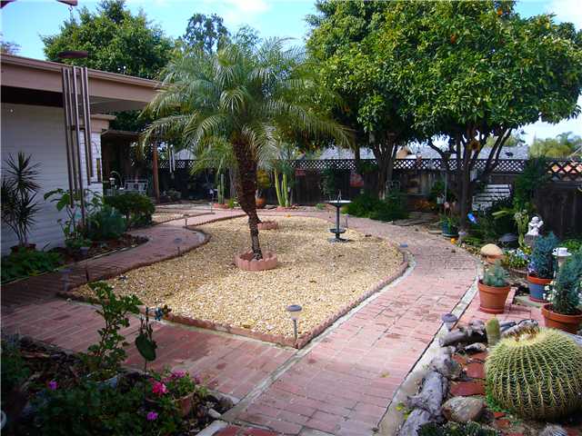 1330 East Fallbrook Street Fallbrook, CA 92028 - Photo 10 of 22 Inviting walking paths throughout the property. Fruit bearing trees, roses and a variety of plants to enjoy!