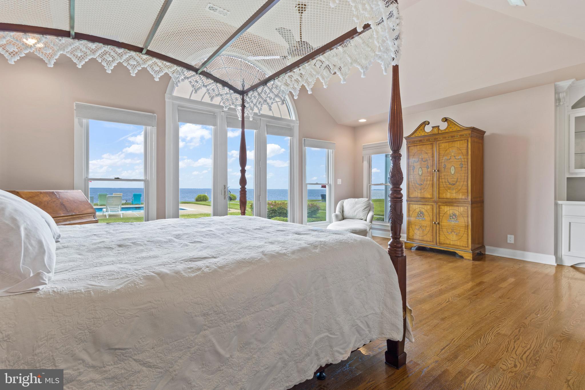 239 Bay Front Drive Pasadena, MD 21122 - Photo 15 of 33 Primary's bedroom suite with soaring ceilings