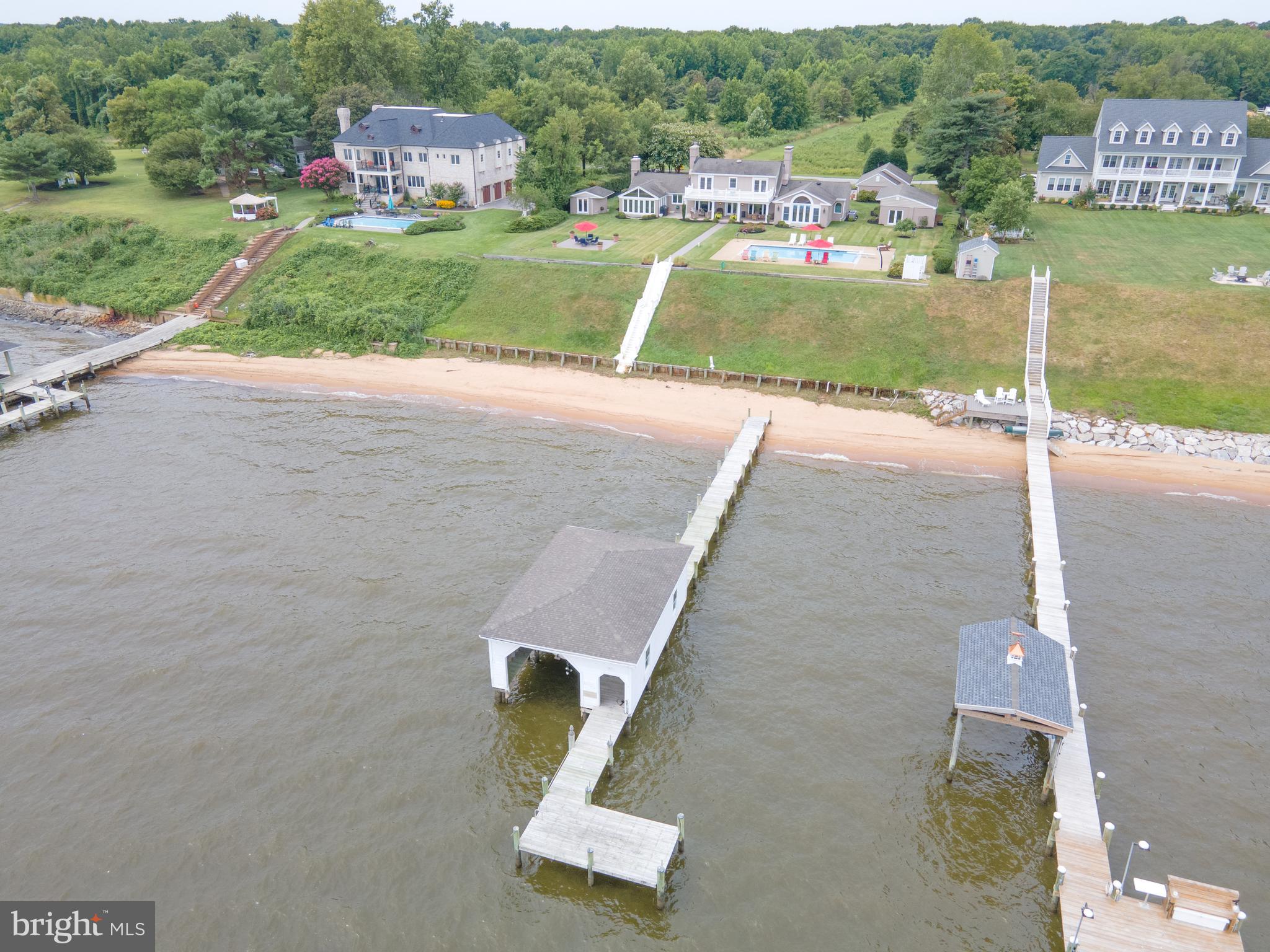 239 Bay Front Drive Pasadena, MD 21122 - Photo 28 of 33 Pier with boathouse