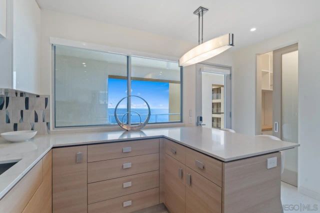 a view of dining room and wooden floor