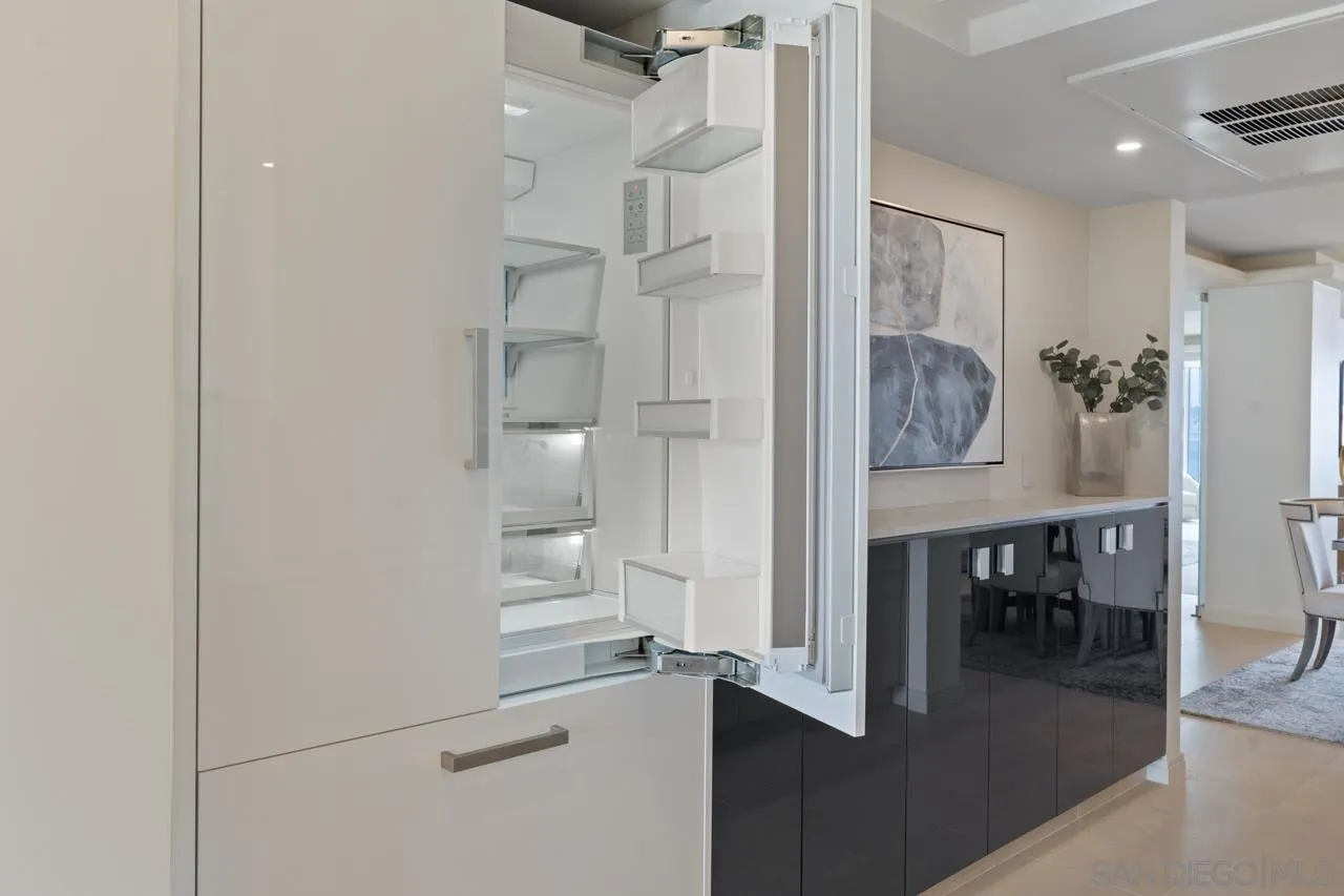 939 Coast La, Unit 16G La Jolla, CA 92037 - Photo 26 of 69 a view of dining room and wooden floor