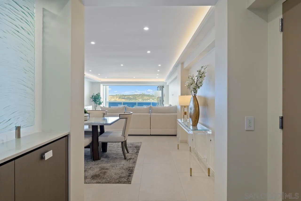 939 Coast La, Unit 16G La Jolla, CA 92037 - Photo 30 of 69 a room with furniture and a fireplace