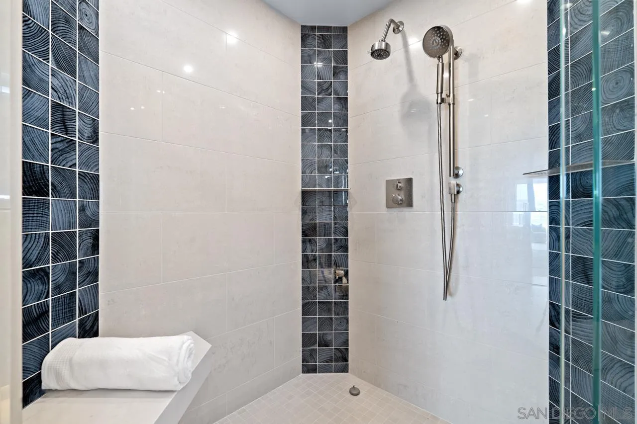 939 Coast La, Unit 16G La Jolla, CA 92037 - Photo 41 of 69 a bathroom with a shower and a toilet