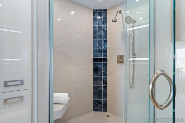 a view of swimming pool with outdoor seating