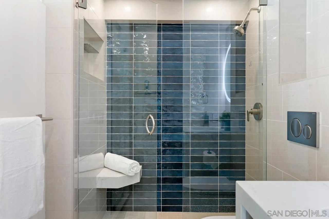 939 Coast La, Unit 16G La Jolla, CA 92037 - Photo 50 of 69 a bathroom with a shower