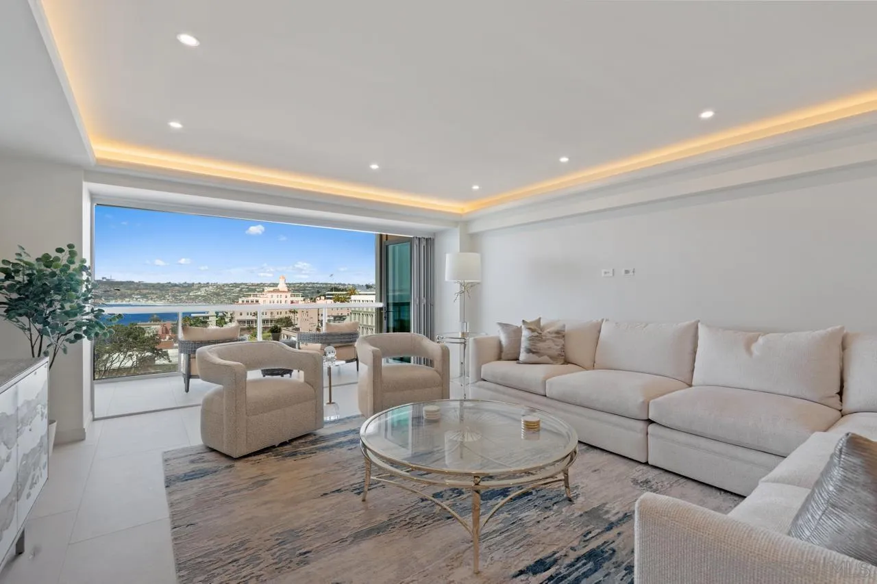 939 Coast La, Unit 16G La Jolla, CA 92037 - Photo 9 of 69 a living room with furniture and a large window