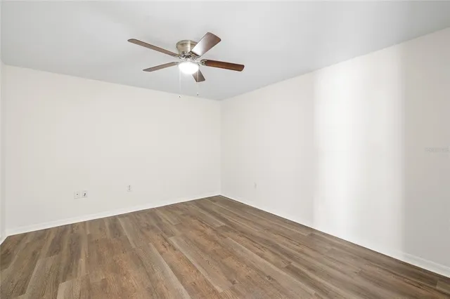a view of a big room with wooden floor