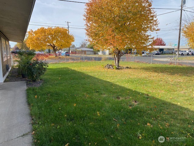 9016 Bong Loop, Unit B Moses Lake, WA 98837 - Photo 7 of 19 a view of yard with swimming pool