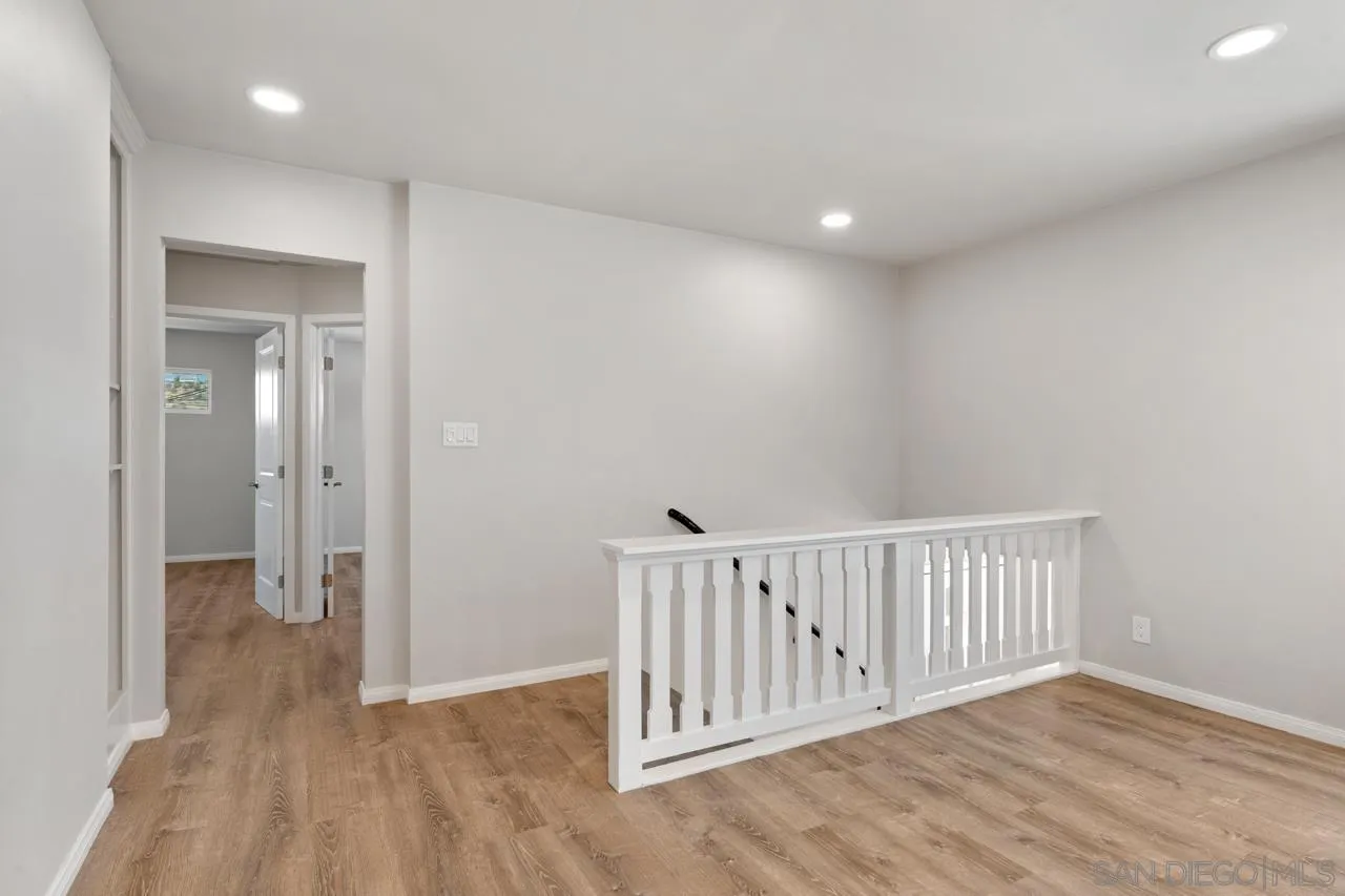 3276-3282 Main Street Lemon Grove, CA 91945 - Photo 11 of 75 a view of a hallway with wooden floor