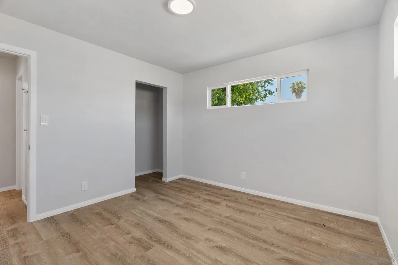 3276-3282 Main Street Lemon Grove, CA 91945 - Photo 21 of 75 an empty room with wooden floor and windows
