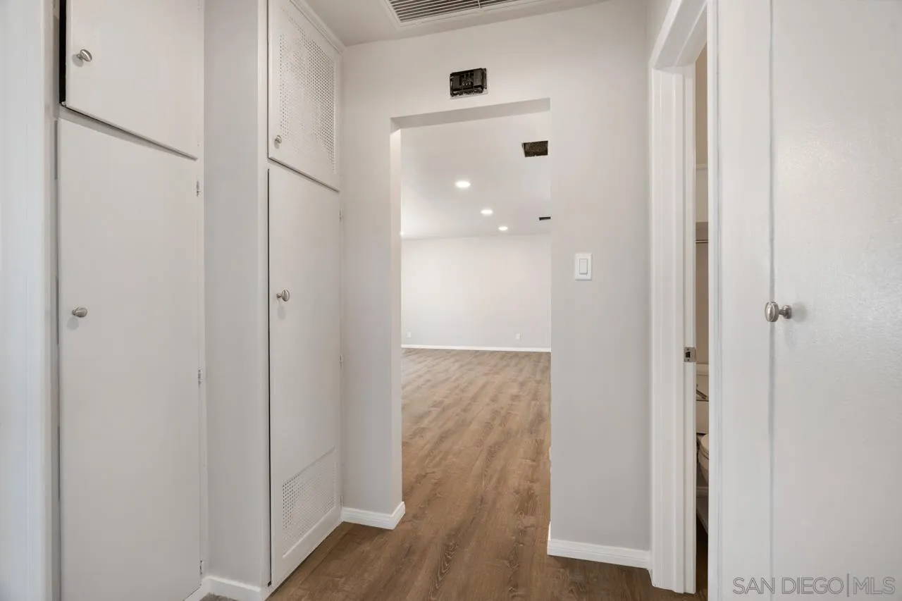 3276-3282 Main Street Lemon Grove, CA 91945 - Photo 24 of 75 a view of a hallway with wooden floor