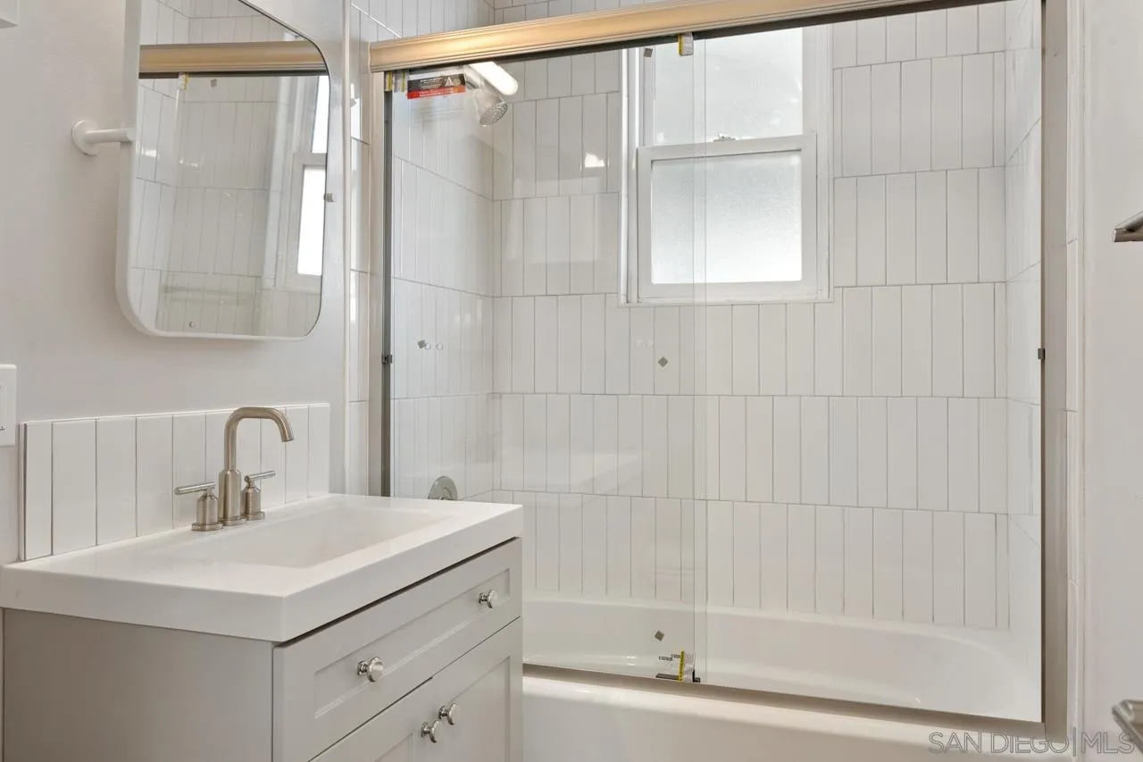 3276-3282 Main Street Lemon Grove, CA 91945 - Photo 27 of 75 a bathroom with a sink and a mirror