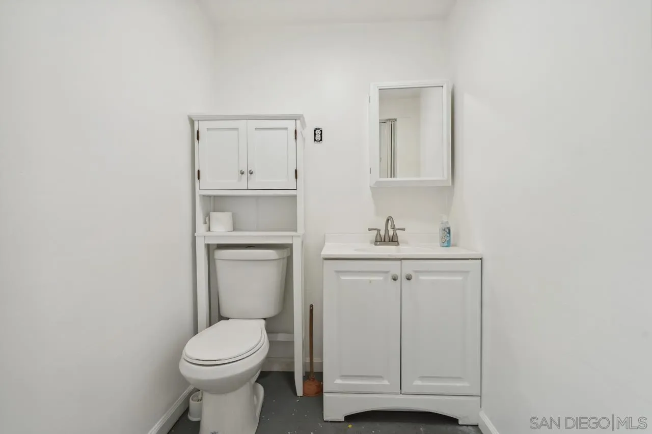 3276-3282 Main Street Lemon Grove, CA 91945 - Photo 61 of 75 a bathroom with a sink toilet and vanity