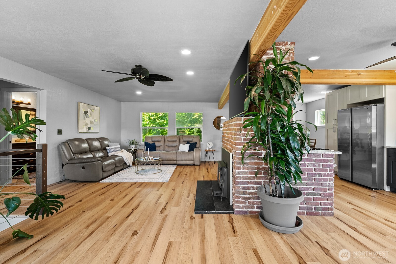 307 4th Street Steilacoom, WA 98388 - Photo 5 of 39 a living room with furniture and a potted plant