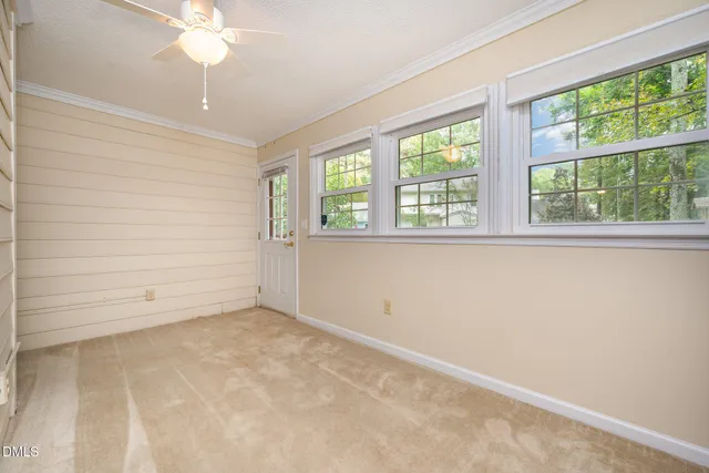 a utility room with sink dryer and washer