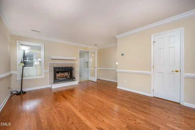 a picture of a bench in front of a wall