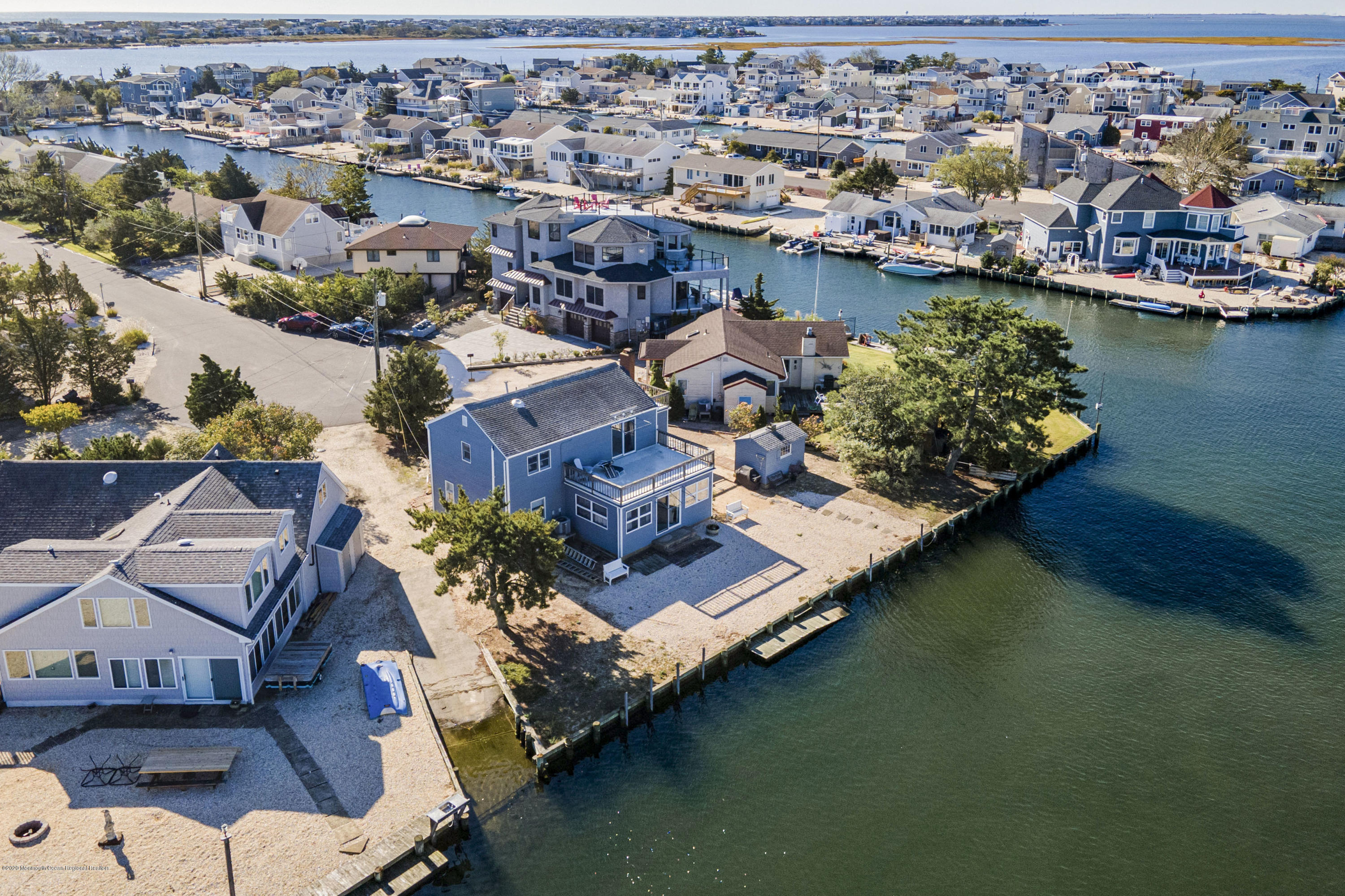 50 Amherst Road Barnegat Light, NJ 08006 - Photo 1 of 34 an aerial view of a house with a ocean view