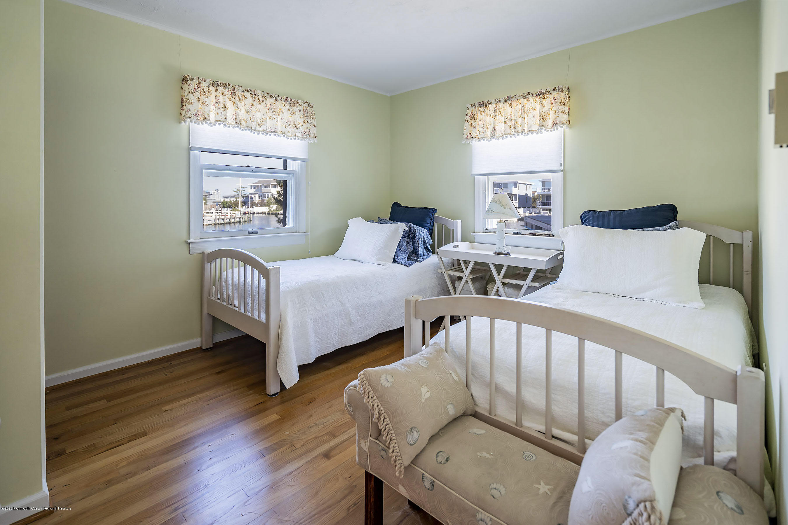 50 Amherst Road Barnegat Light, NJ 08006 - Photo 2 of 34 a bedroom with two beds and a table