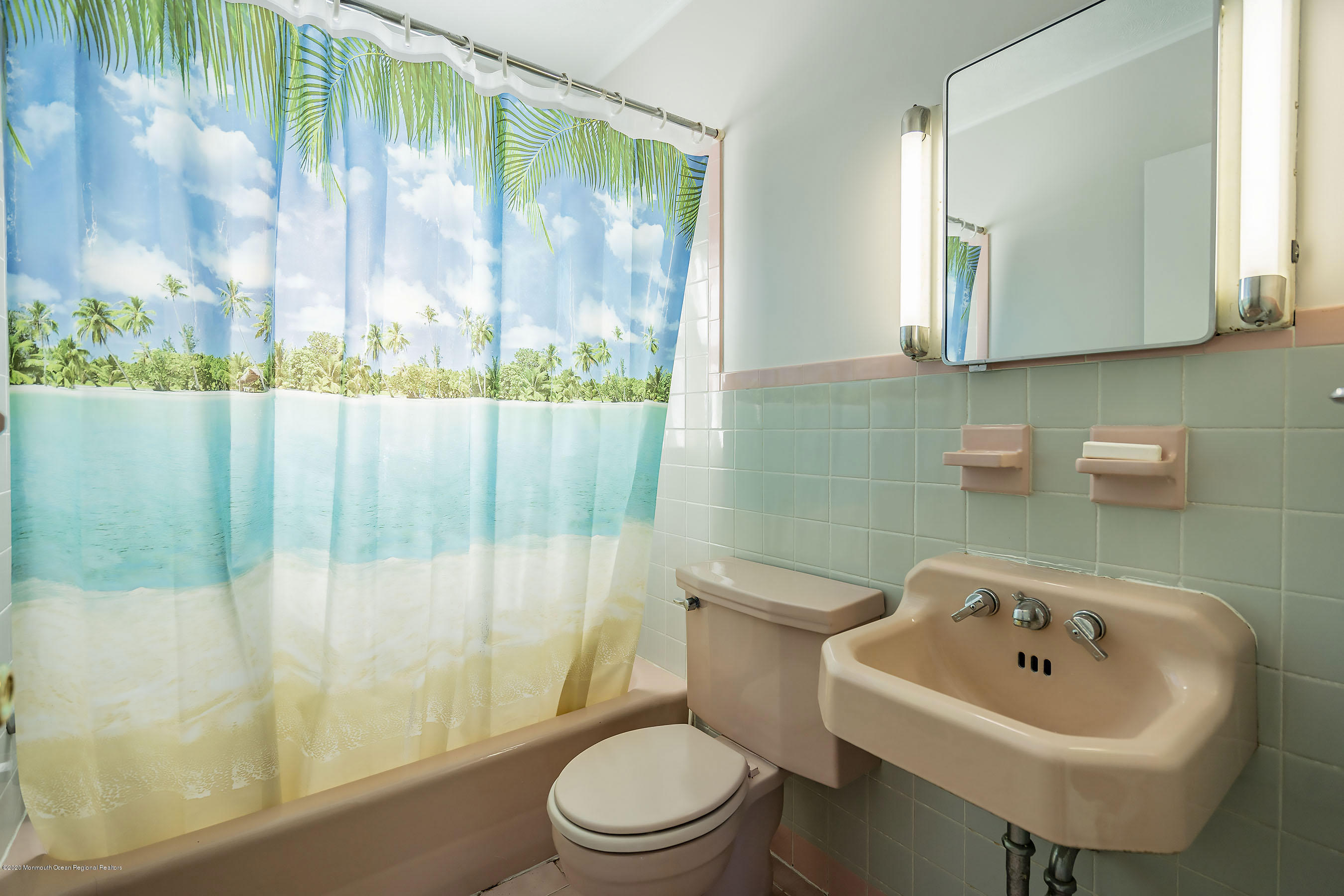 50 Amherst Road Barnegat Light, NJ 08006 - Photo 22 of 34 a bathroom with a sink a toilet and a bathtub
