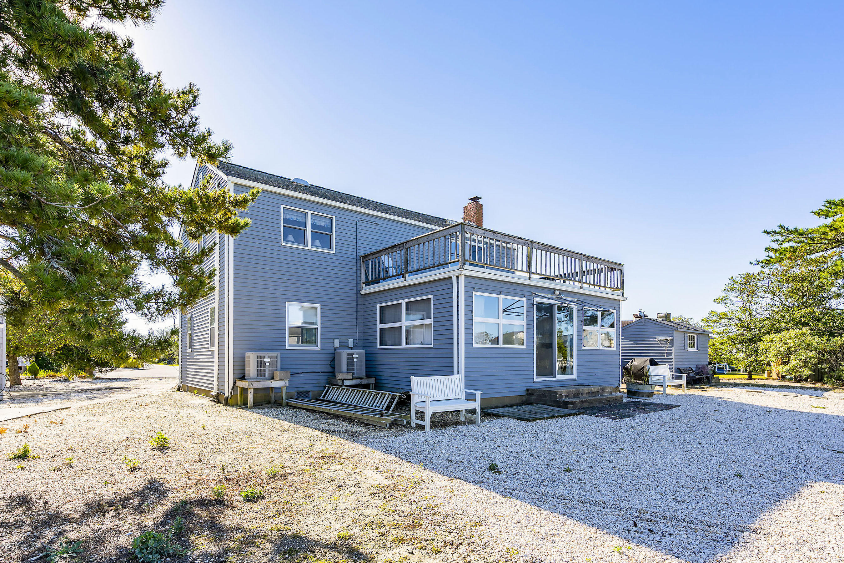 50 Amherst Road Barnegat Light, NJ 08006 - Photo 29 of 34 a front view of a house with a yard