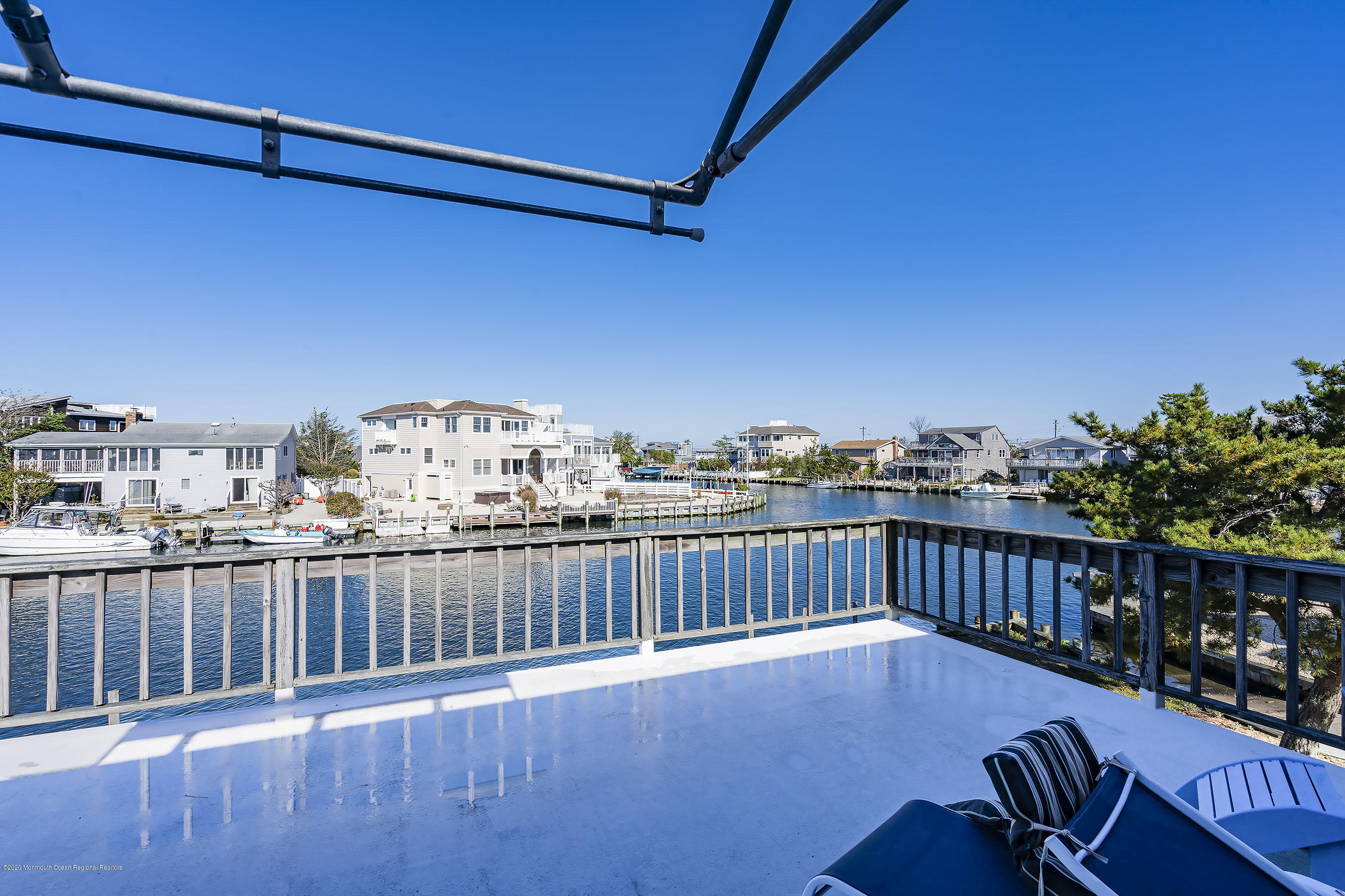 50 Amherst Road Barnegat Light, NJ 08006 - Photo 8 of 34 a view of a balcony with wooden floor