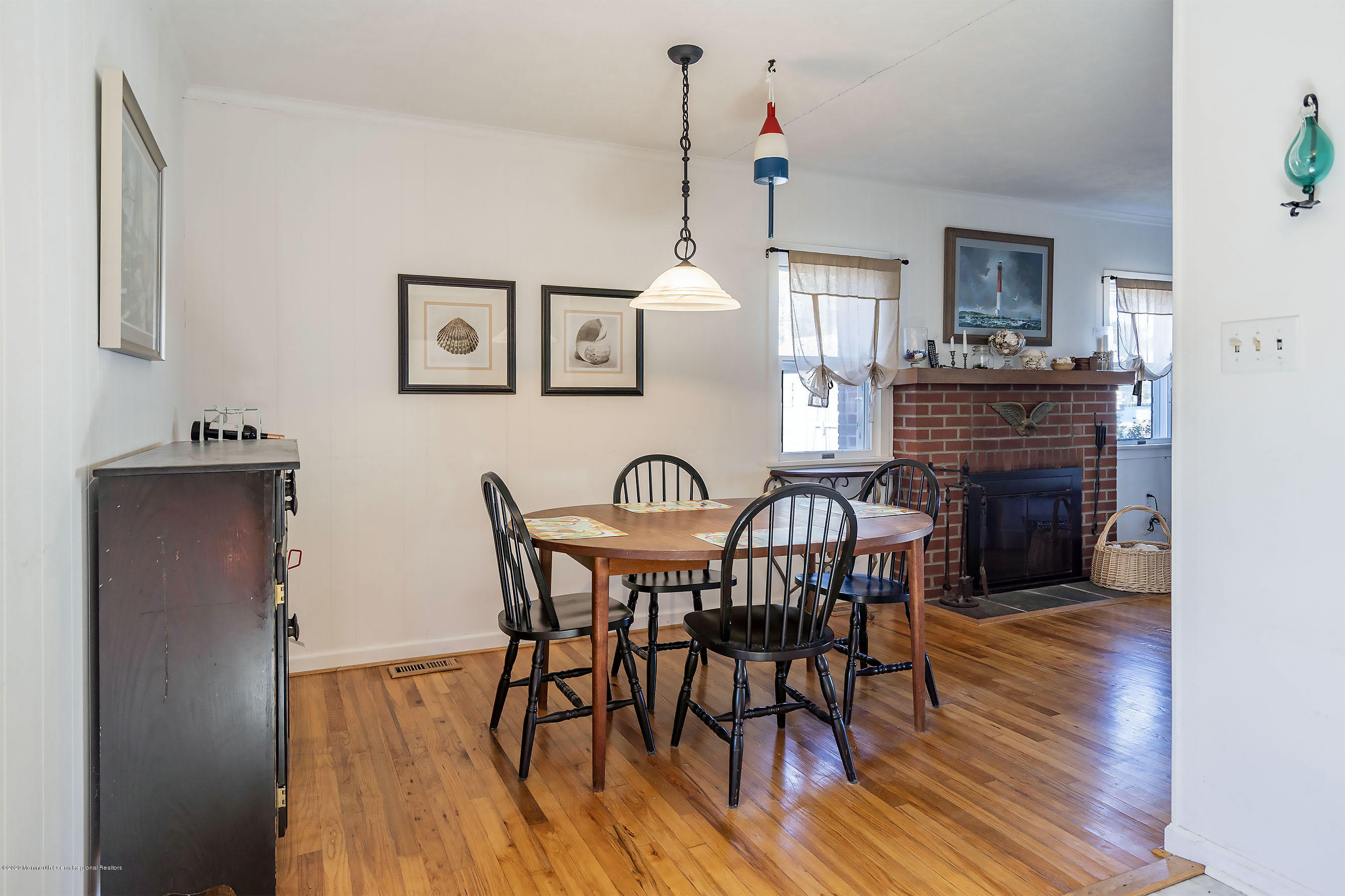 50 Amherst Road Barnegat Light, NJ 08006 - Photo 10 of 34 a view of a dining room with furniture and wooden floor