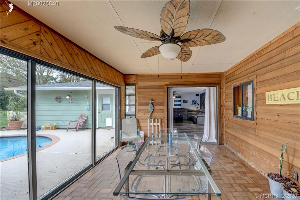 1654 Southwest 85th Terrace Stuart, FL 34997 - Photo 23 of 48 a view of a porch with seating space