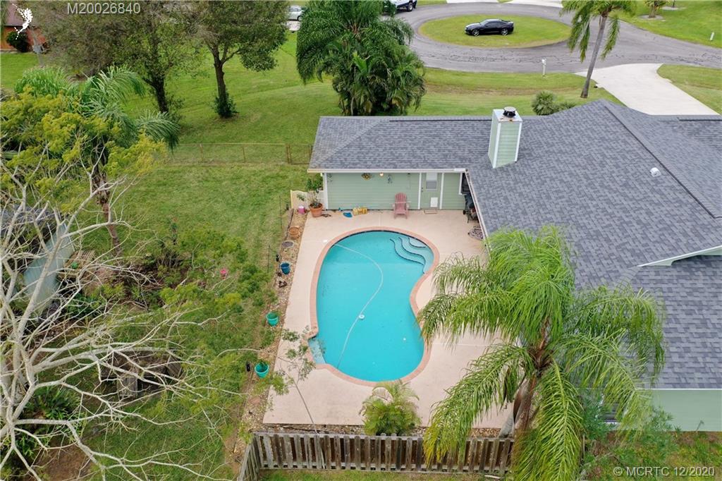 1654 Southwest 85th Terrace Stuart, FL 34997 - Photo 43 of 48 an aerial view of a house having yard