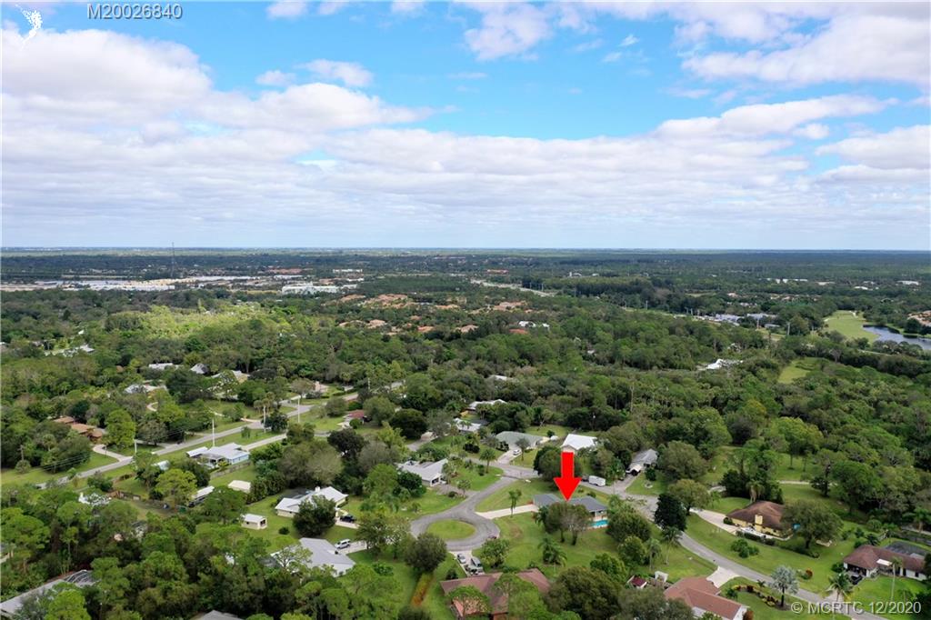 1654 Southwest 85th Terrace Stuart, FL 34997 - Photo 48 of 48 an aerial view of multiple house